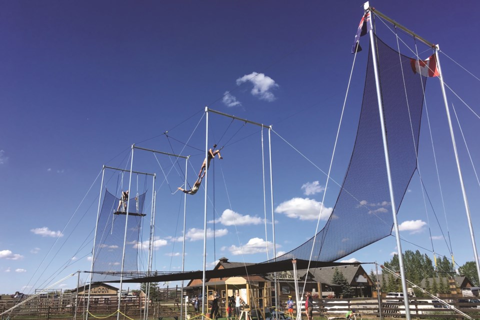 Rocky Mountain Flying Trapeze is hosting free open fly sessions this month in conjunction with the Calgary Medieval Faire and Artisan Market.