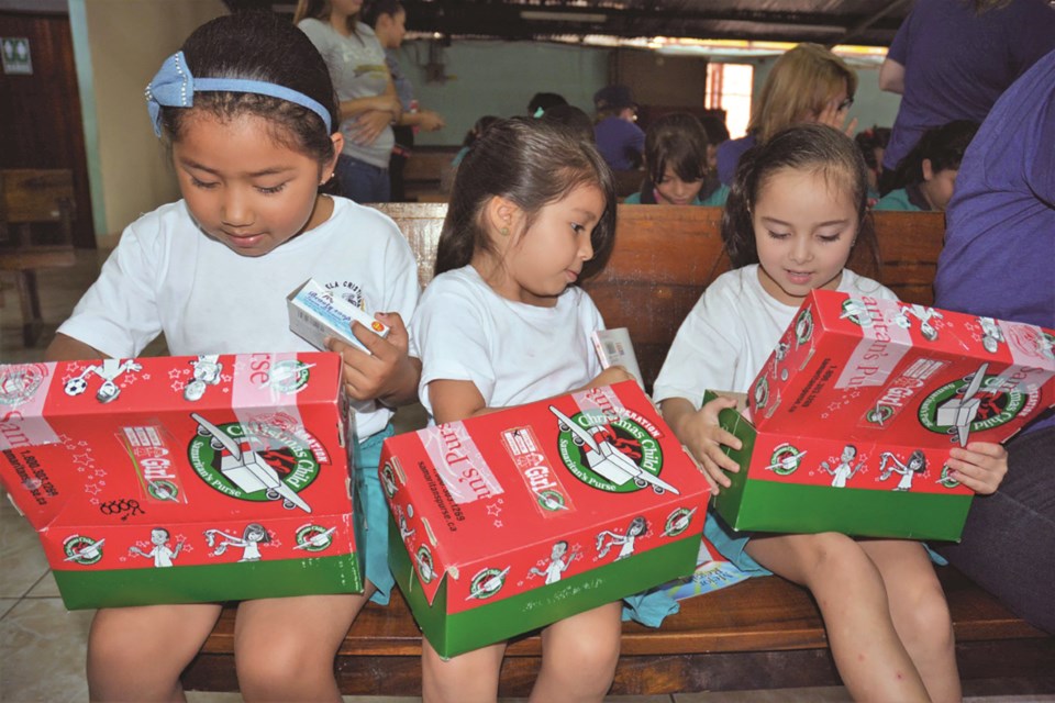 Children in Costa Rica are pictured opening their Canadian-packed Operation Christmas Child shoeboxes. In total, Airdrie residents packed 2,041 boxes for the organization in 2022.