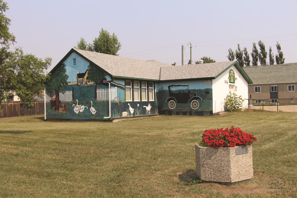 Irricana's Fifty Plus Centre is painted with country scenery along 1st Avenue on July 24.