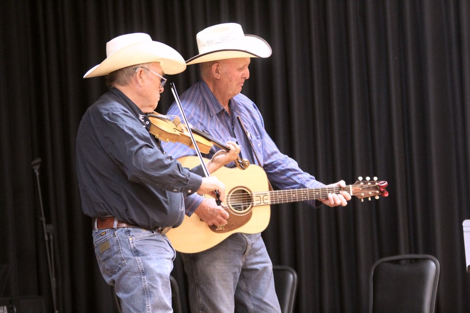 Gary and Bill perform a country duet at the Airdrie Seniors Got Talent night on June 7.