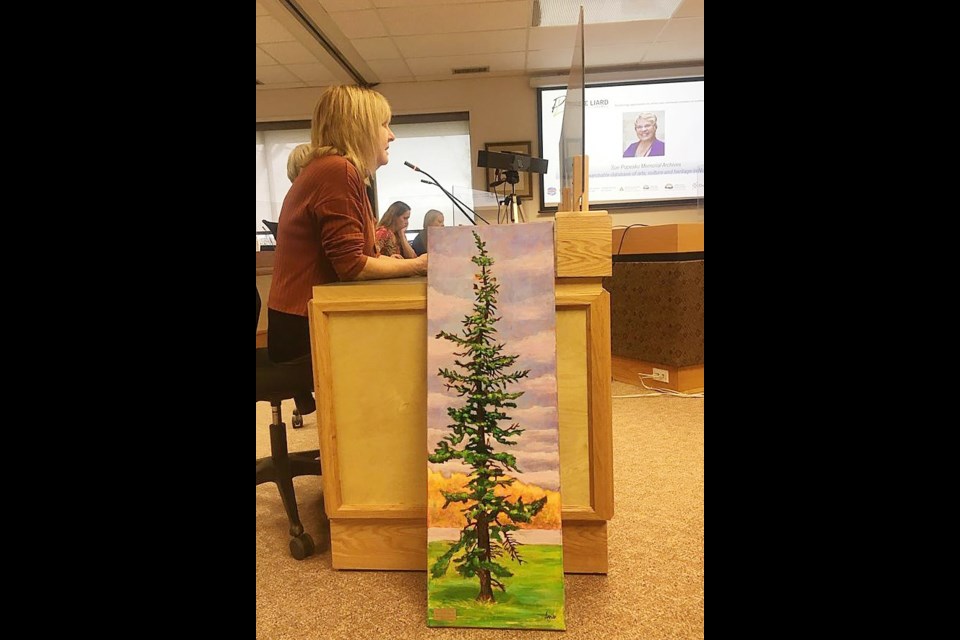 Former Arts North East Executive Director Donna Kane presents Kim Ans' work 'Purple Sky' to the PRRD in 2020. 
