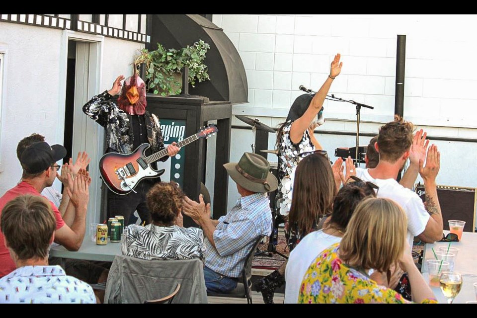 Kitty & the Rooster officially opened the Lido Theatre’s Luna Lounge Aug. 19. Kitty, former Taylorite Jodie Ponto, and partner Noah Walker (left), performed on the Lido’s new rooftop patio which can seat up to 50 people for a concert or other event.