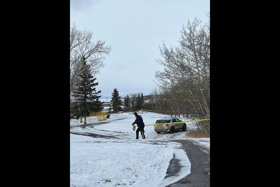 An RCMP officer at the scene in Kin Park in Dawson Creek on October 27. 