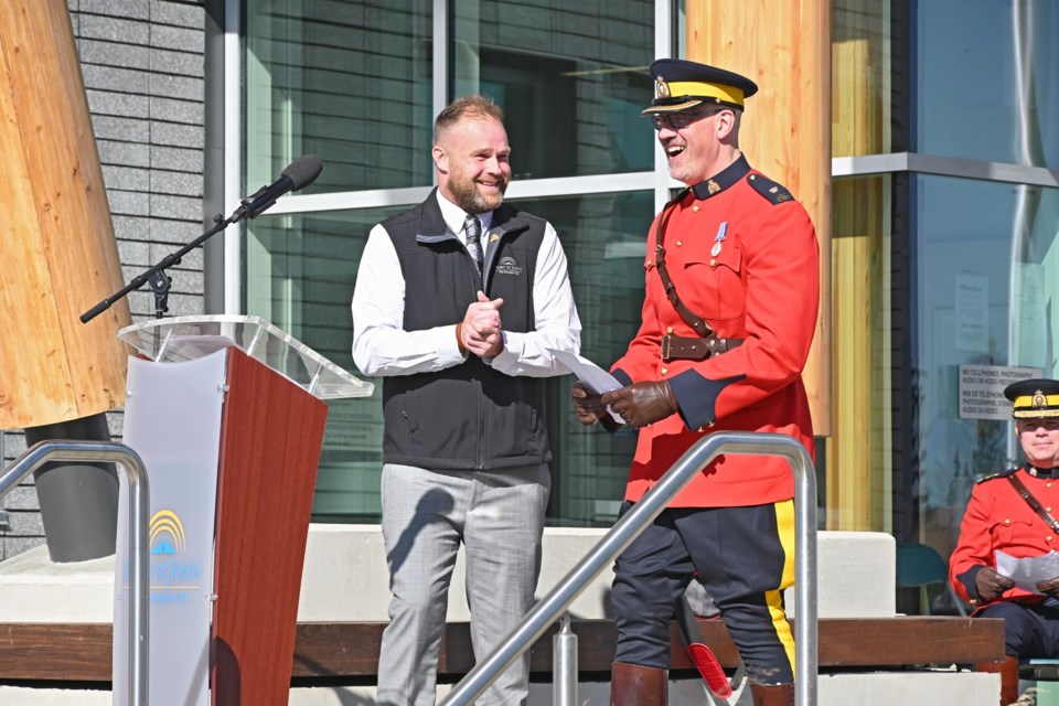 City councillor Trevor Bolin and RCMP Insp. Tony Hanson at the opening ceremony. 
