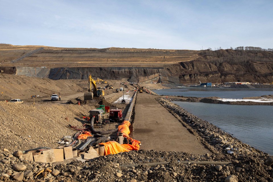 Crews have completed the downstream cofferdam at Site C, March 2021. With both the upstream and downstream cofferdams now complete, crews can begin constructing the earthfill dam.