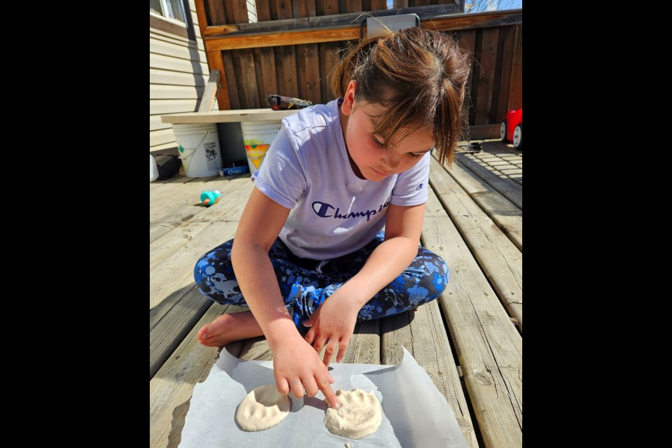 Kendal Crook uses the supplied in kits that were handed out by the Fort St John North Peace Museum. 