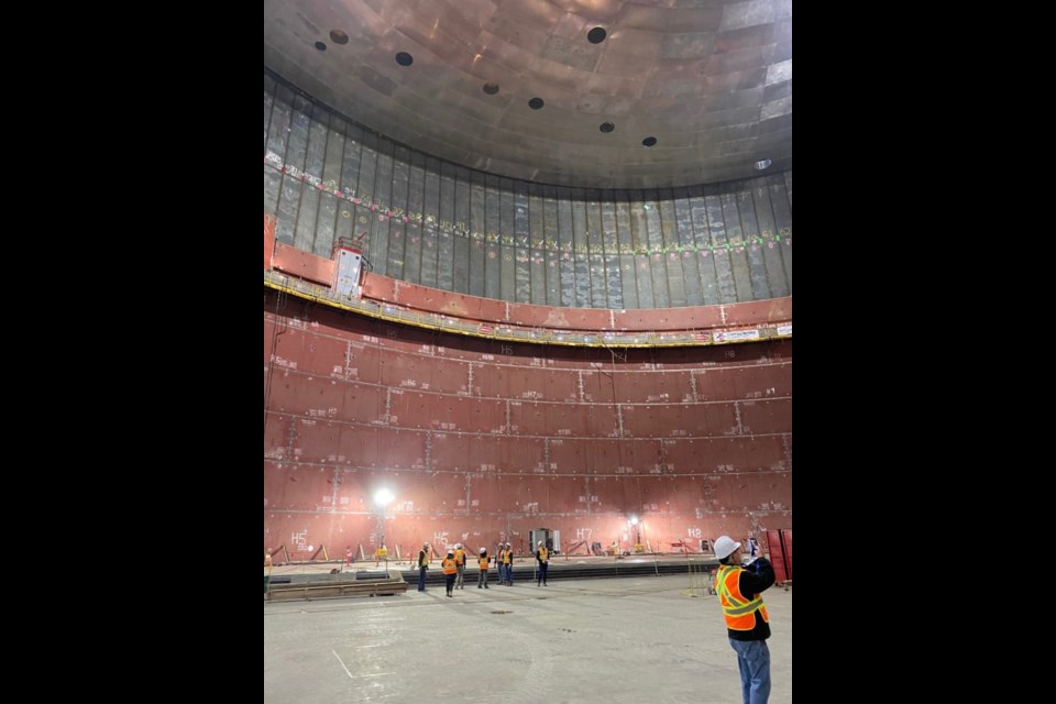 Inside massive LNG storage tank.