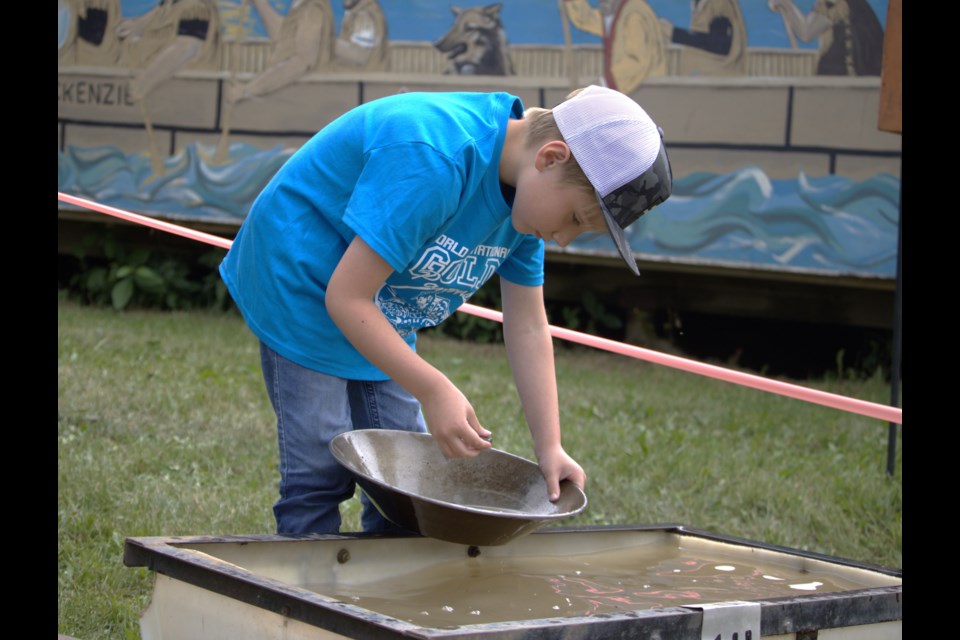 Just some of Saturday's action from the World's Invitational Gold Panning Championships in Taylor 