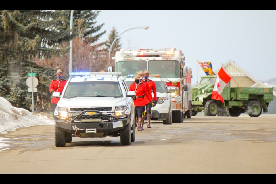 Fort St. John Mounties donned their red serge uniforms and led the way during Ingvar Nelson's birthday parade, April 10, 2021.
