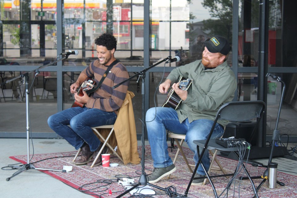 Airik Clark and Ryan Sebastiano entertain the crowd at the city's festival plaza on July 7, 2022.