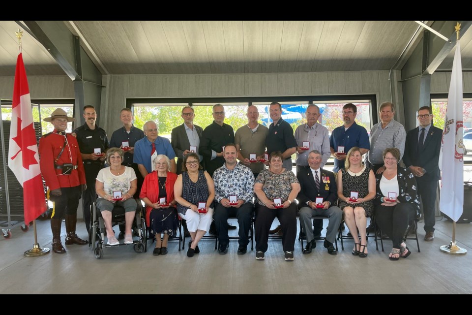 The recipients of a Queen's Platinum Jubilee medallion during a ceremony held by MP Bob Zimmer in Fort St. John on Aug. 17, 2022.