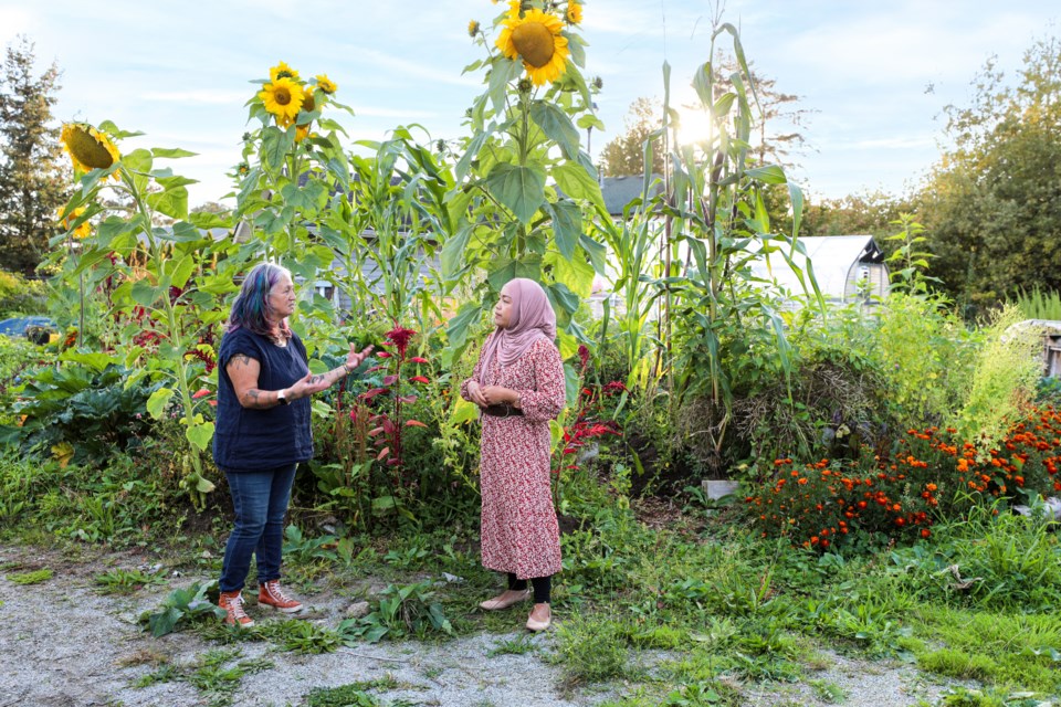 At Harmony Garden in B.C. speaking with co-ordinator T'uy't'tanat-Cease Wyss. Photo supplied.