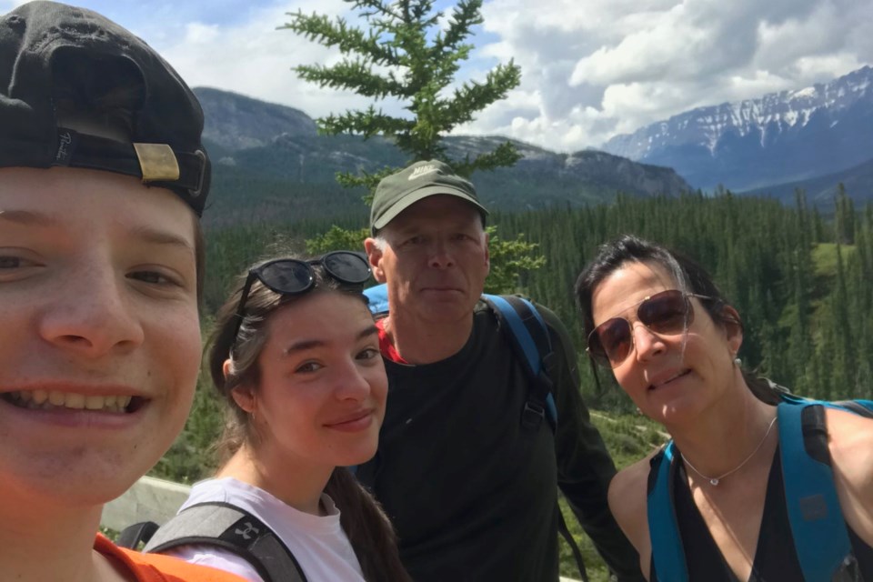 Ian, Anna, Gary and Peggy Snydmiller take a break during a hike near Nordegg in early July. Photo supplied