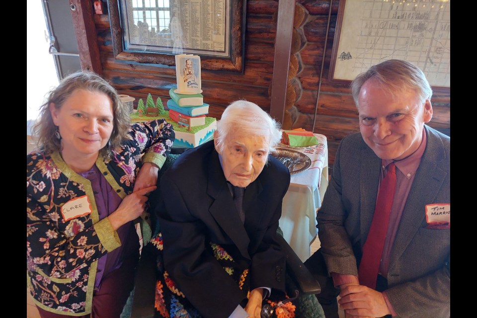 Tony Cashman with documentary film creators Clare Mullen and Tim Marriott at his 100th birthday party. Photo supplied.