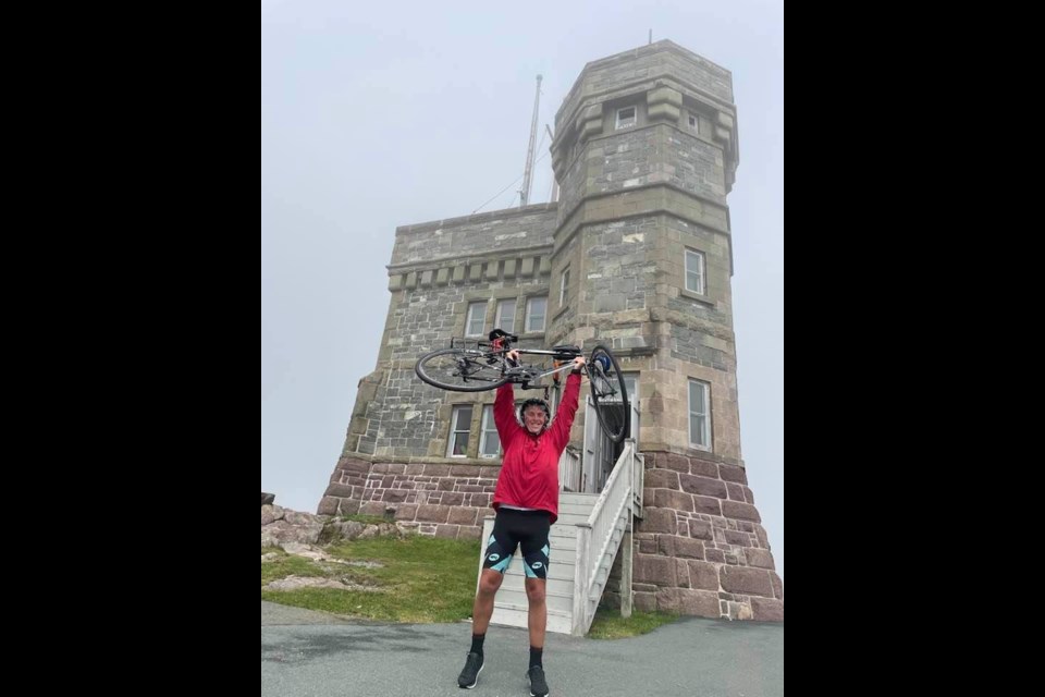  Edmonton's Tom Walsh, 63, celebrates the completion of his cross-Canada ride at Signal Hill in St. John's, Newfoundland in early September. Photo submitted.