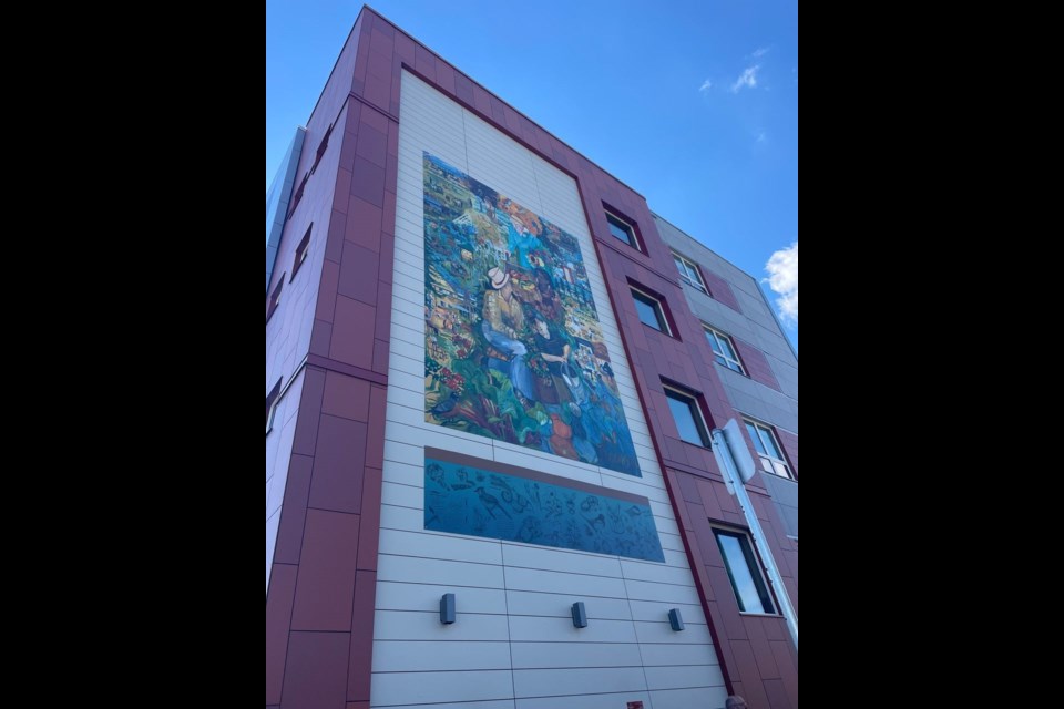 Community-focused mural by local artist Jill Thomson adorns the new Canterbury Heights. Photo supplied.