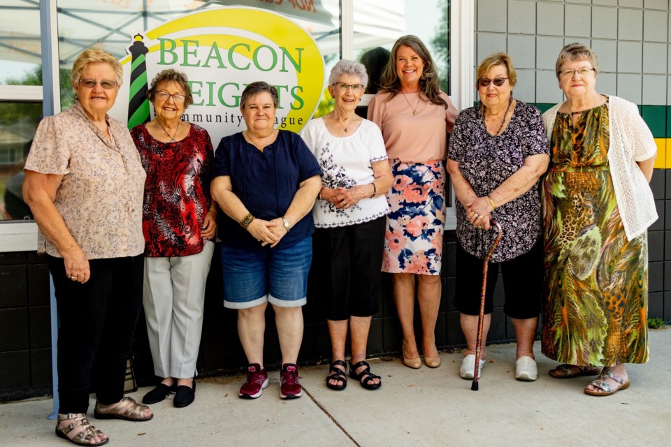  Senior Pat Moffitt (far left) and members of the senior's group at Beacon Heights Community League in Edmonton, Aug. 2022. Photo: Dave DeGagne/Alberta NDP.