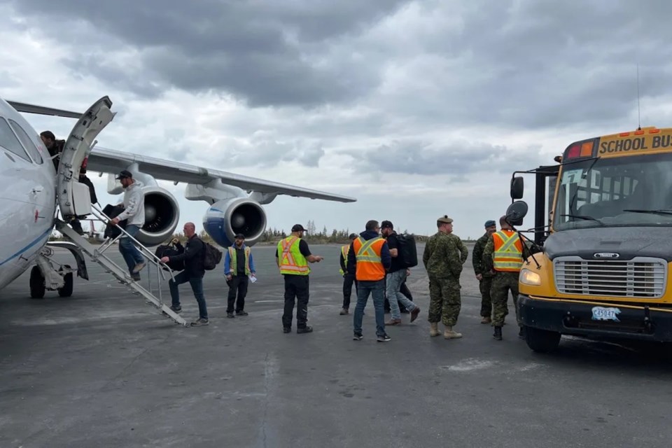 evacuees-board-summit-flight-aug-18-photo-trung-bui