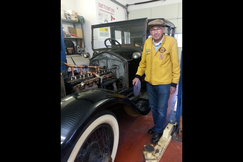 Howard Lengert has the largest collection of Rolls Royce and Bentleys in Canada. He's working on one of the oldest in the collection now. Photo Lucy Haines