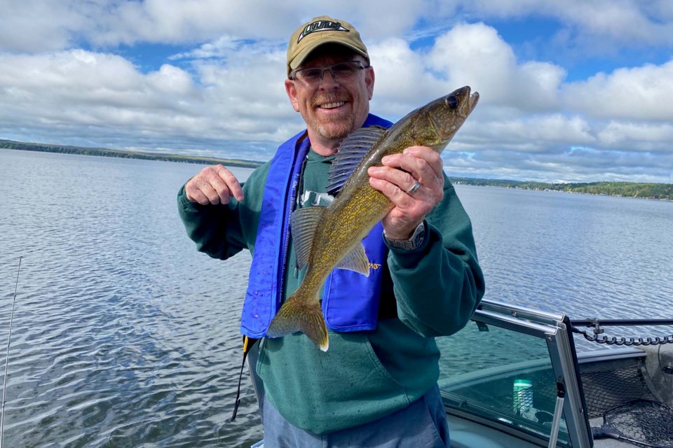 Bob Paterson is all smiles after catching a walleye at Fallis Point on Lake Wabamun. Photo submitted
