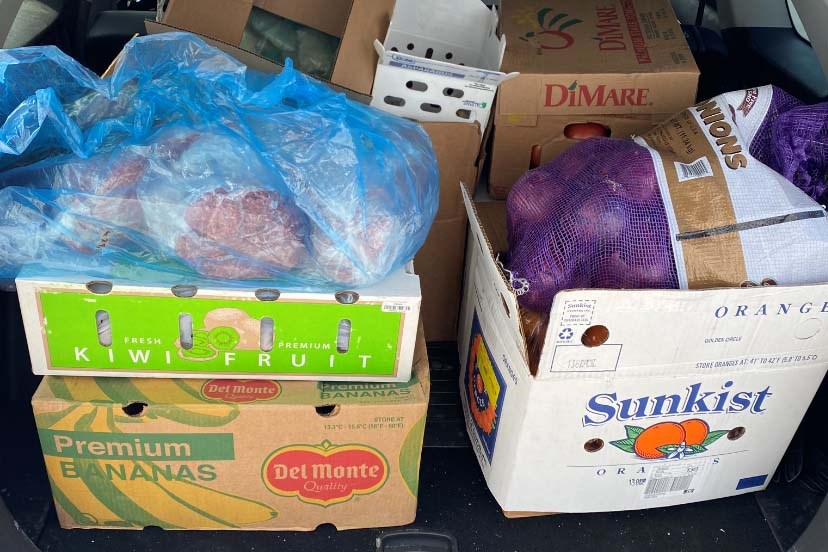 Groceries are packed into the trunk of Rob Filby's vehicle. Photo supplied.