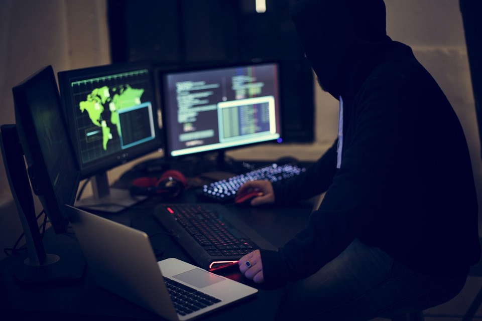 asc-april-spotlight-hacker-working-using-computer-with-codes