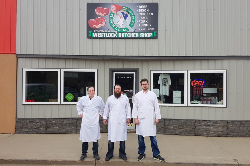 The owners of the Westlock Butcher Shop Ben Lanouette, left, Paul Lanouette and Coleby Woodcock stand in front of the popular outlet. (Photo supplied)