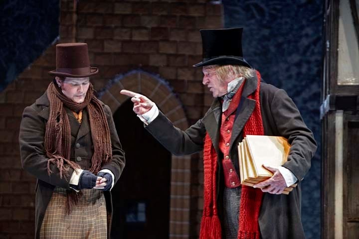 Bob Cratchit (Karl Sine) gets a dressing down from Scrooge (Stephen Hair) in A Christmas Carol