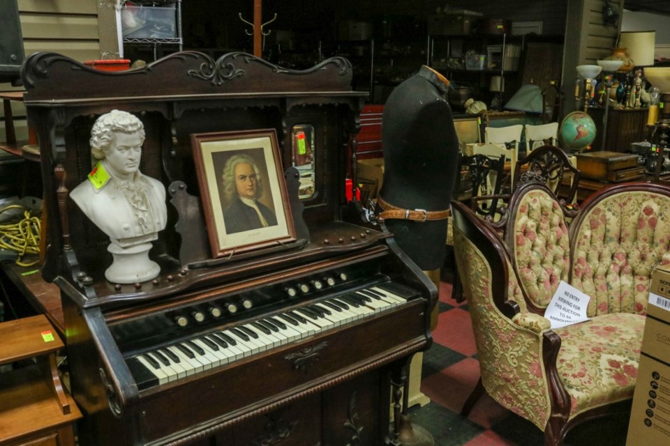 The estate auctions of Madame Rac's belongings included thousands of vintage items, like a sofa/settee, organ and busts. Photo submitted by Kastner Auctions