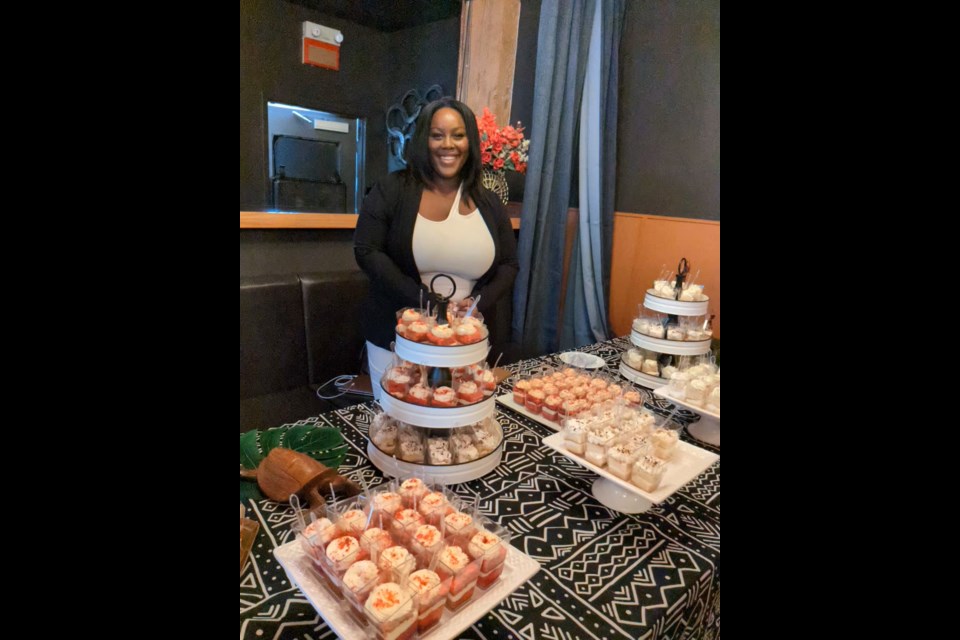 Tarissa, owner of the Edmonton Black-owned business, Layered by Rissa, creates custom cakes for weddings, birthdays, and events like the kick off to Feed the Soul Dining Week. Photo: Lucy Haines