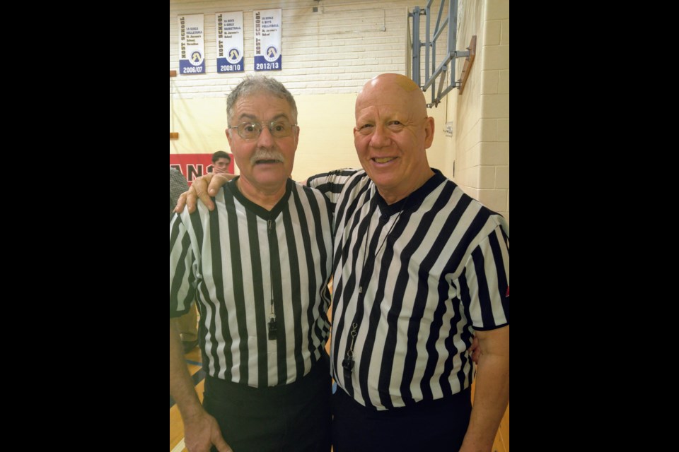 Roy Mills, left, and Bill Adamoski, both retired educators, have been refereeing high school basketball games across central Alberta for decades. Photo supplied.
