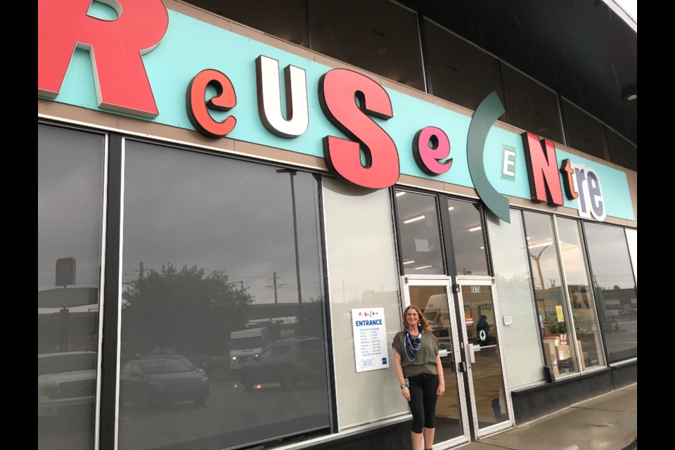 The Reuse Centre program manager Kristin Arnot outside the Edmonton south side facility.   Photo; Gary Poignant 