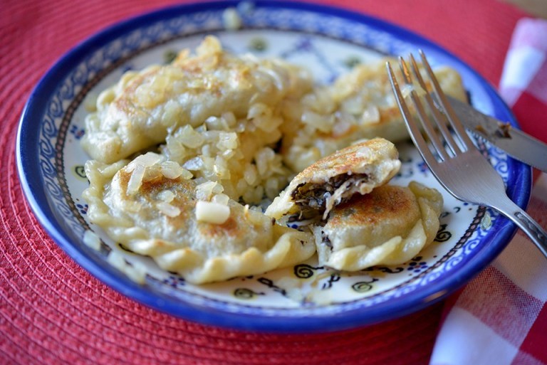 Sauerkraut and mushroom pierogi are typical fare for a Polish Christmas Eve of 12 meatless dishes. Photo: Anna Hurning