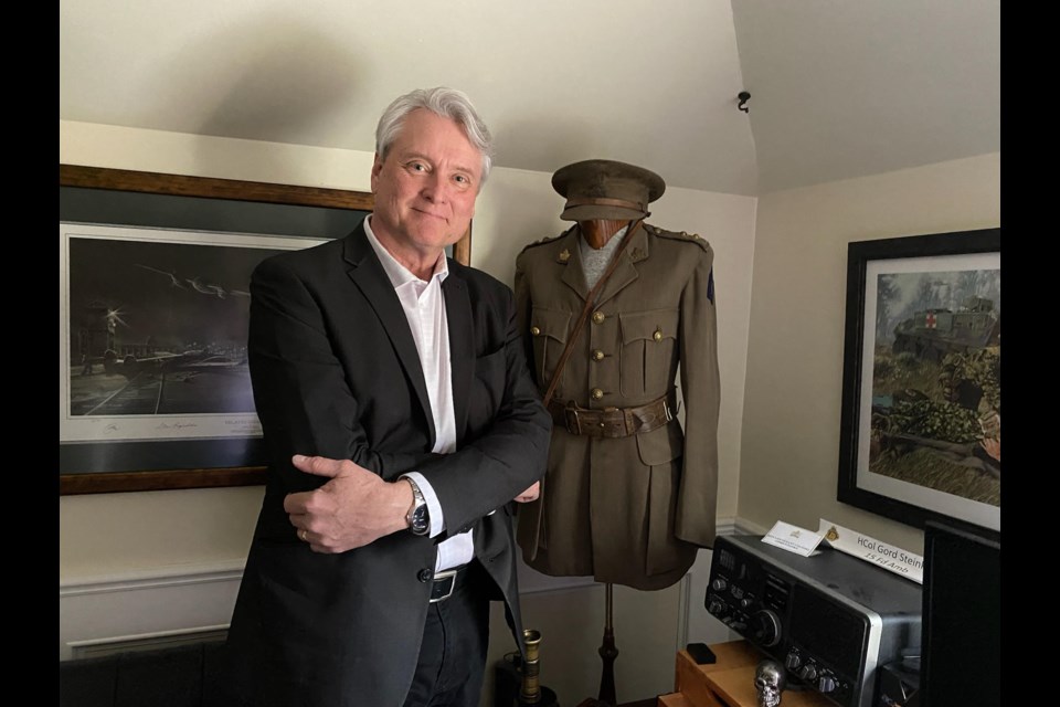  Gord Steinke proudly displays his grandfather's World War I uniform at his Edmonton-area home. Lieutenant Colonel Thomas Herbert Ford fought at Vimy Ridge and Passchendale with Tobin's Tigers - 29th Vancouver Battalion. Photo supplied.