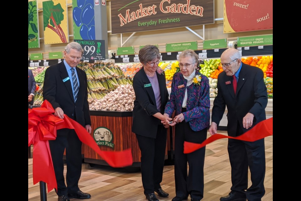 Agnes and Frank Lovsin (centre and right) are an ever-present part of the success of Freson Bros. family grocer. Photo: supplied.