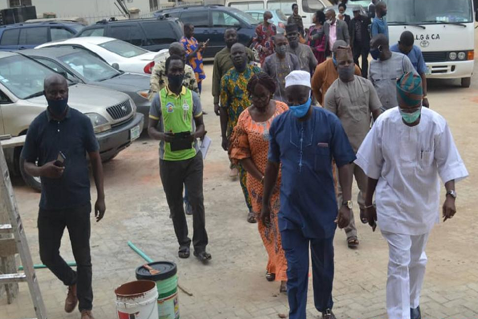 The Executive Chairman, Ayobo Ipaja LCDA, Hon. Yusuf Sakiru Adisa, leading the Commissioner for Local Government and Community Affairs, Hon. (Dr.) Wale Ahmed and his team, to his office, when the latter visited the LCDA.