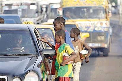 begging on a road of Lagos
