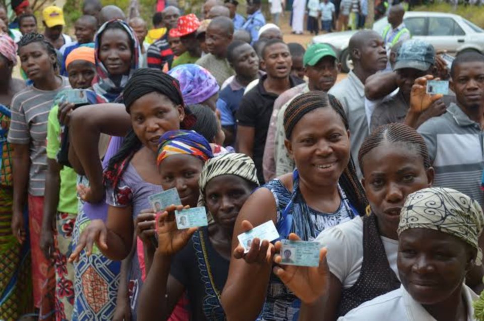 Voters displaying their PVCs