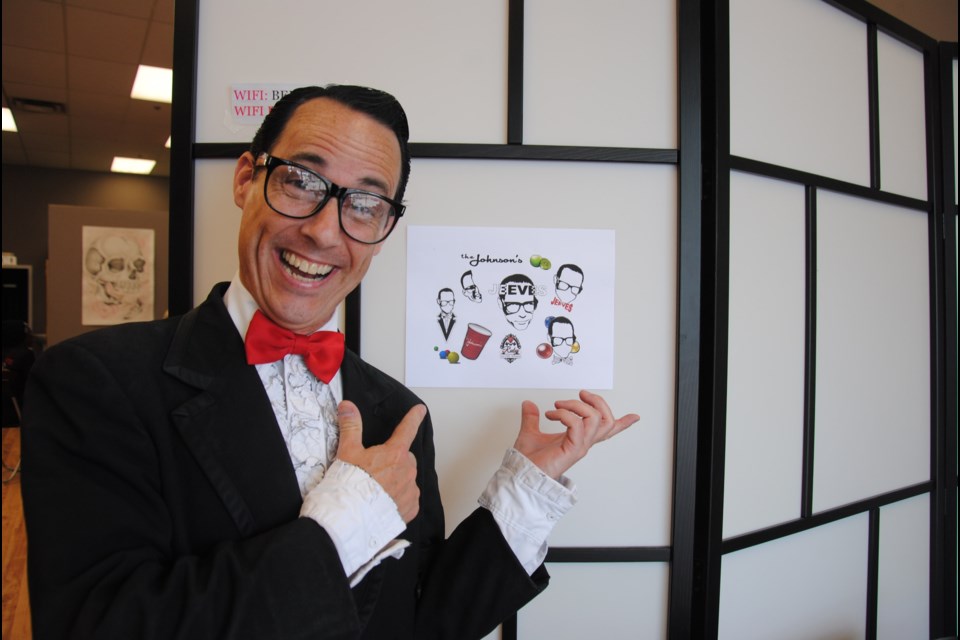 The Johnson's Residence butler Jeeves shows the tattoo options that will gain patrons free entry to the nightclub on Friday nights.