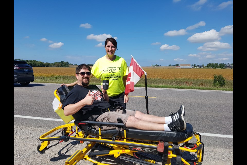 Shawn Gibson represented BarrieToday on the Paramedic push Friday, staying on the stretcher for 55 minutes and 4.5 km. Supplied photo