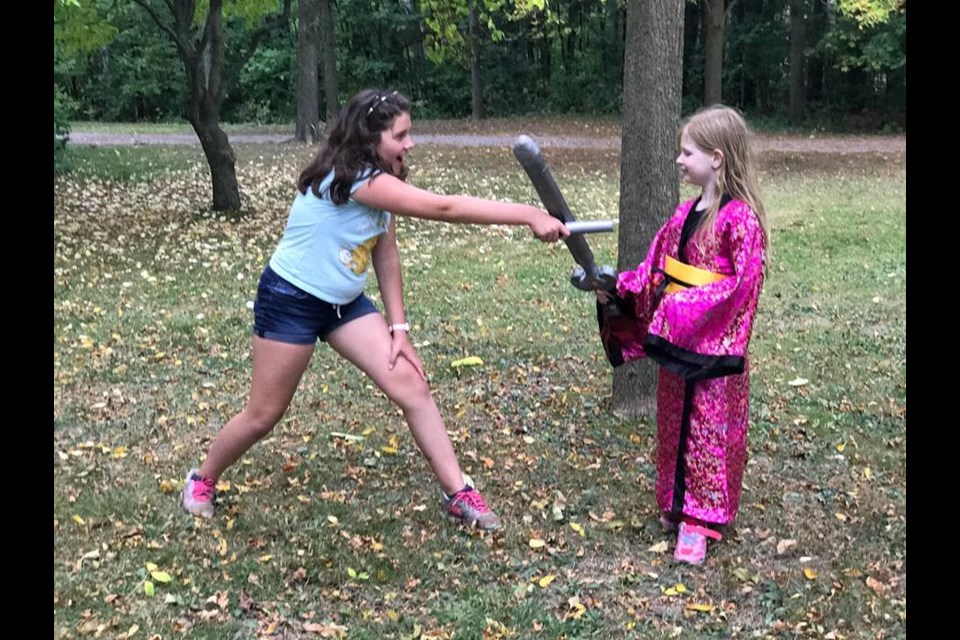 Two children enjoy social play during a LARPing field trip. Shawn Gibson for BarrieToday