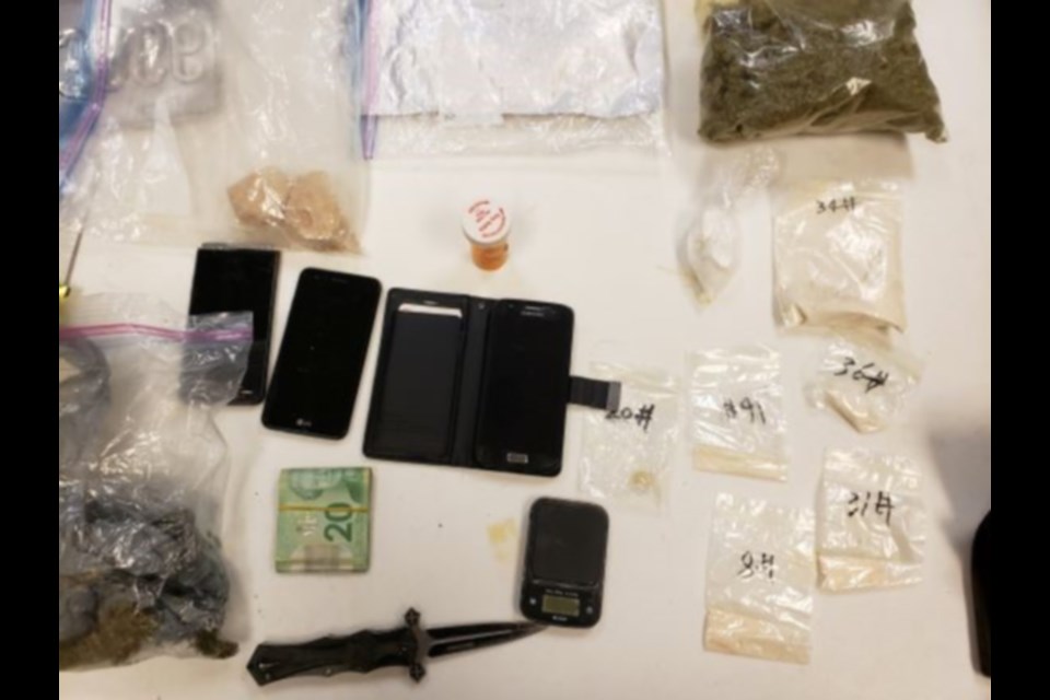 Drugs, currency, weapons seized in Friday night's drug investigations. Photo supplied by OPP