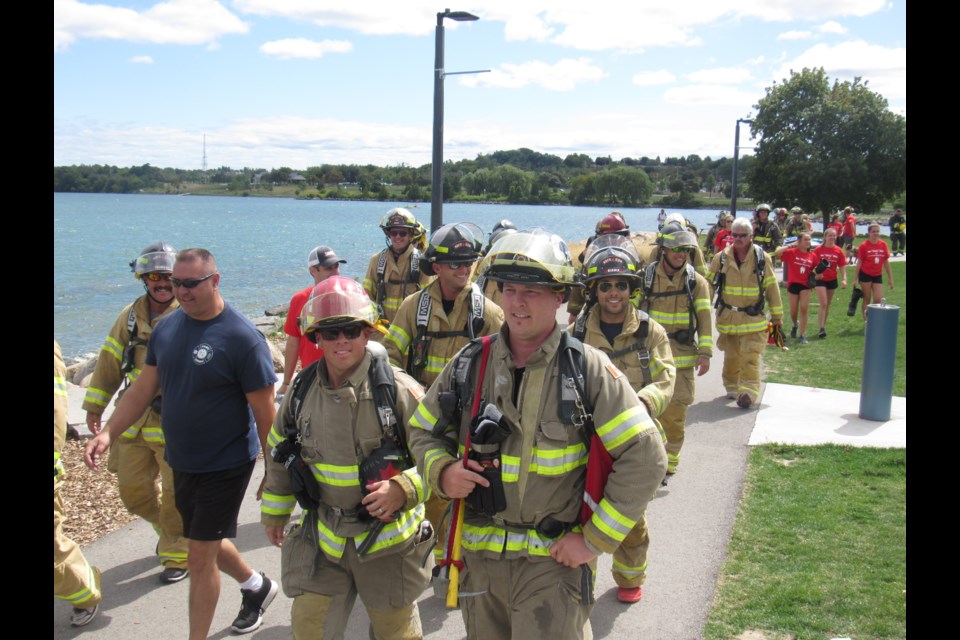 Firefighters from across the region walked 20km in full gear to help William Dwyer reach his goal of $1 million for the Terry Fox Foundation, Saturday August 24, 2019. Shawn Gibson/BarrieToday                              