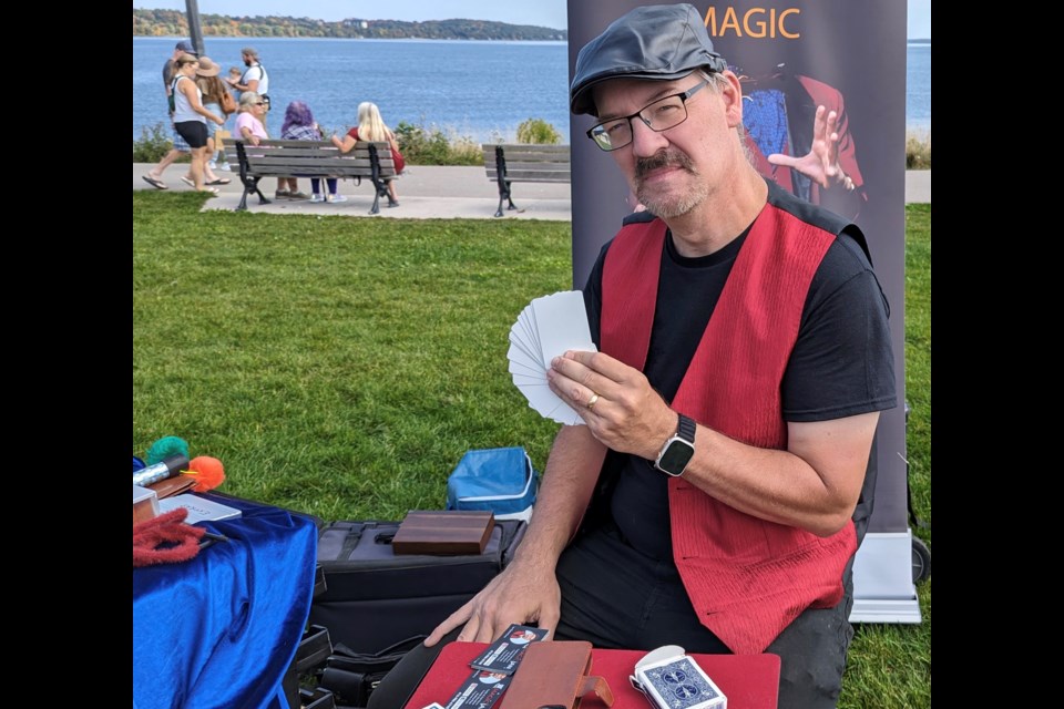 Magic Ian shows his cards at Sunday's By the Bay Fall Fest in Barrie.