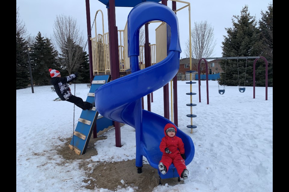 Kids get some fresh air while playing at Cheltenham Park in northeast Barrie.
