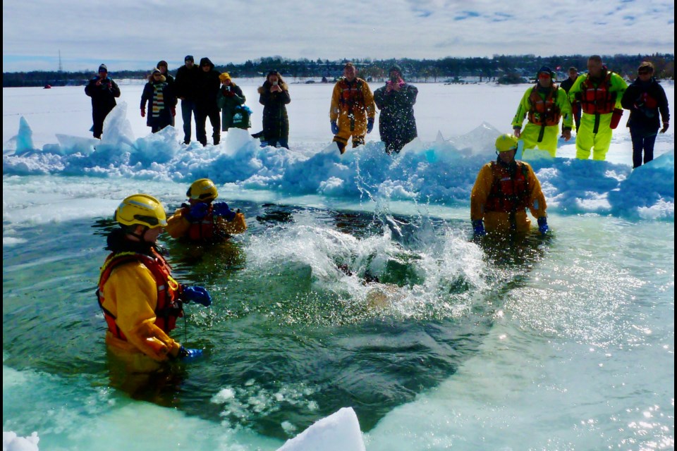 A man takes the Polar Plunge on Saturday in Barrie.