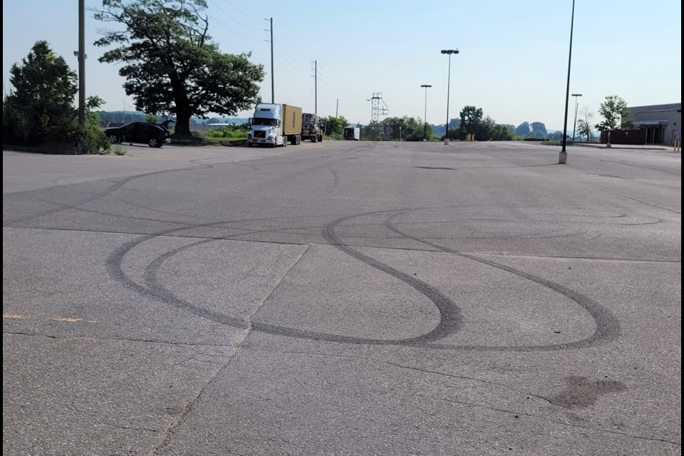 Tire tracks left behind in a parking lot at Georgian Mall following an unsanctioned truck rally June 3, 2023.