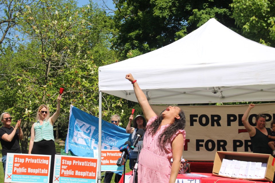 Simcoe County Health Coalition co-chair Anisa Carrascal celebrates the "overwhelming" results of the province-wide people's referendum against plans to privatize health care during a press conference Tuesday afternoon at Sunnidale Park in Barrie.