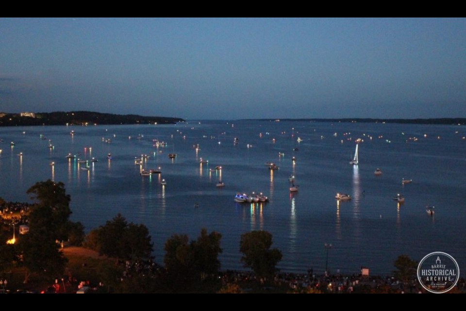 Waiting for fireworks to begin as the sky darkens over Kempenfelt Bay on July 1, 2014.