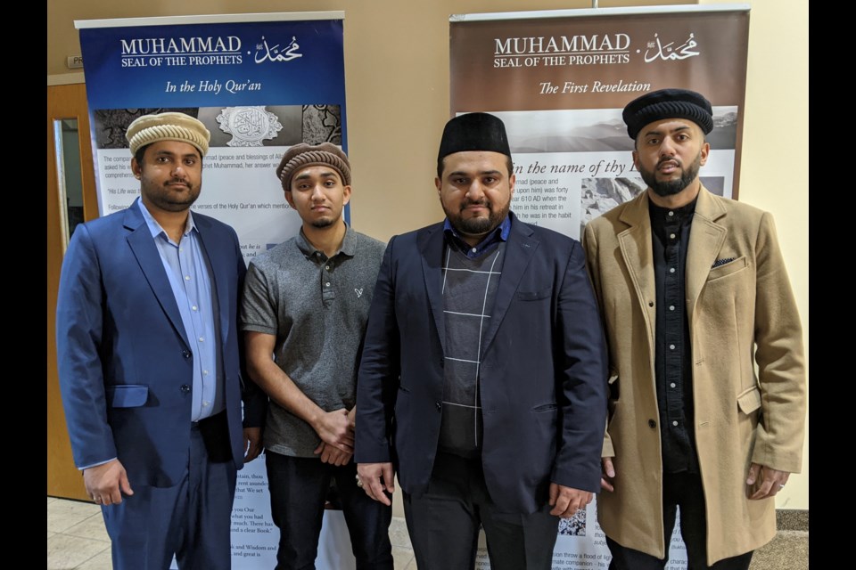 Shown at Saturday’s Explore Islam event are, from left, Moaz Ahmad, Ihtisham Ahmed, Imam Bilal Bhatti and Hassaan Shahid.
